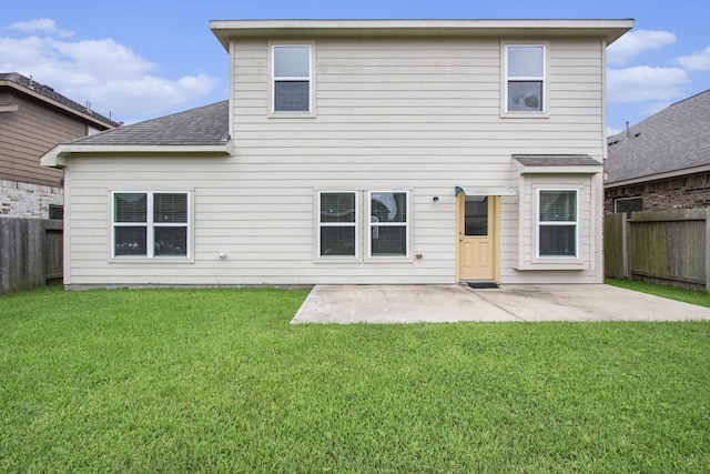 2311 Langley Dr, Rosharon, TX 77583 - back of house featuring a fenced backyard, a patio, and roof with shingles
