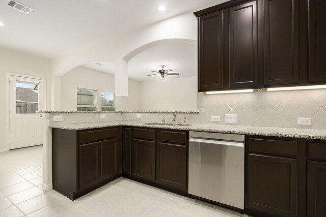 2311 Langley Dr, Rosharon, TX 77583 - kitchen with dishwasher, tasteful backsplash, dark brown cabinetry, ceiling fan, and recessed lighting