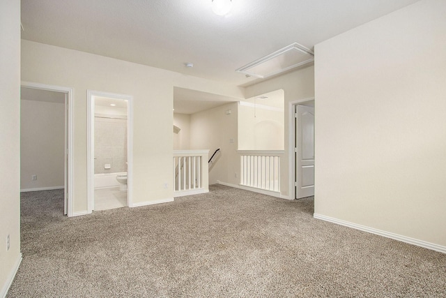 2311 Langley Dr, Rosharon, TX 77583 - spare room with attic access and carpet floors