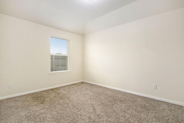 2311 Langley Dr, Rosharon, TX 77583 - carpeted empty room featuring baseboards and vaulted ceiling
