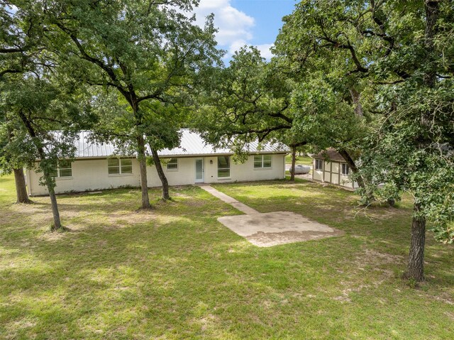 73 Fairway Dr, Normangee, TX 77871 - view of green lawn featuring an outdoor structure
