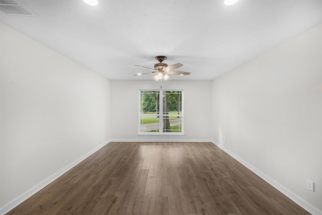 73 Fairway Dr, Normangee, TX 77871 - empty room featuring a ceiling fan, dark wood-style floors, and recessed lighting