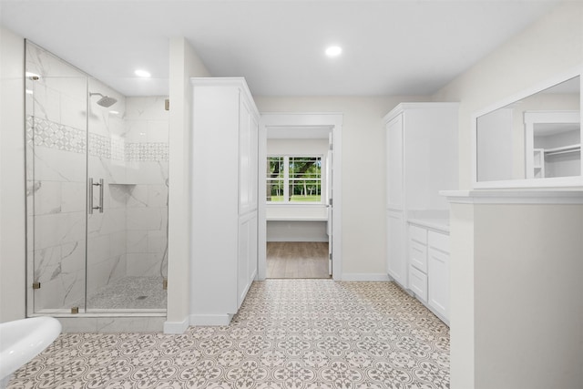 73 Fairway Dr, Normangee, TX 77871 - full bath featuring a stall shower, recessed lighting, and a closet