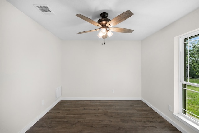 73 Fairway Dr, Normangee, TX 77871 - spare room with dark wood-type flooring and a ceiling fan