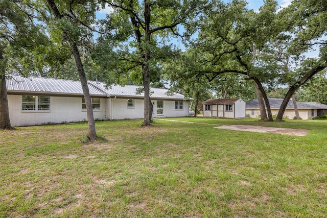 73 Fairway Dr, Normangee, TX 77871 - view of grassy yard with an outdoor structure