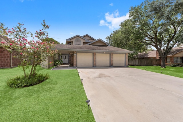 9827 Gold Cup Way, Houston, TX 77065 - view of front of house with a garage, brick siding, concrete driveway, and a shingled roof