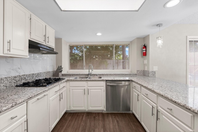 9827 Gold Cup Way, Houston, TX 77065 - kitchen featuring dishwasher, under cabinet range hood, black gas cooktop, dark wood-style flooring, and white cabinets