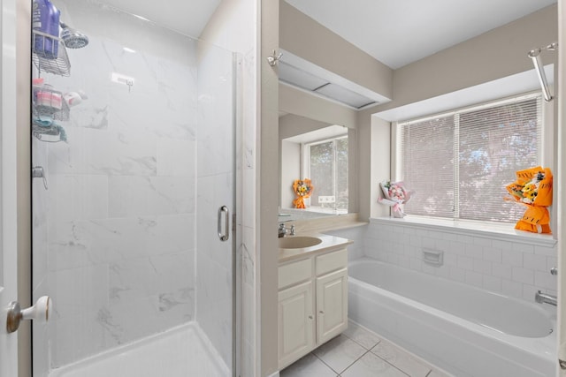 9827 Gold Cup Way, Houston, TX 77065 - full bathroom featuring a stall shower, tile patterned flooring, vanity, and a bath