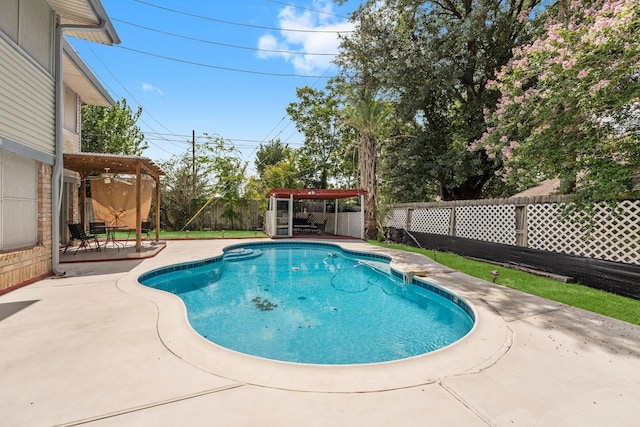 9827 Gold Cup Way, Houston, TX 77065 - view of swimming pool featuring a fenced backyard and a patio area