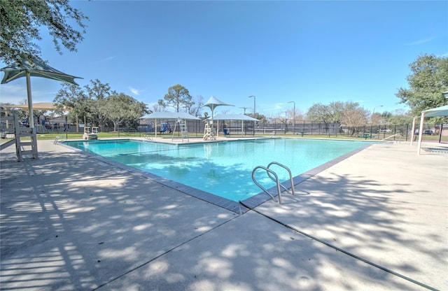 3214 Worthington Dr, Pearland, TX 77584 - community pool featuring a patio area