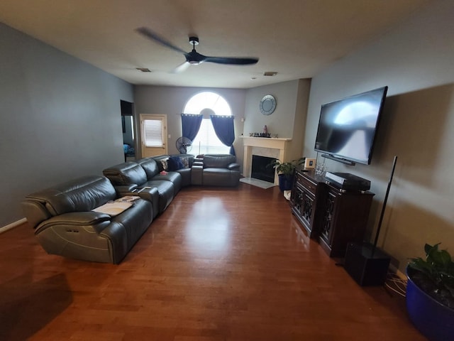 3214 Worthington Dr, Pearland, TX 77584 - living area with ceiling fan, a fireplace, and wood finished floors