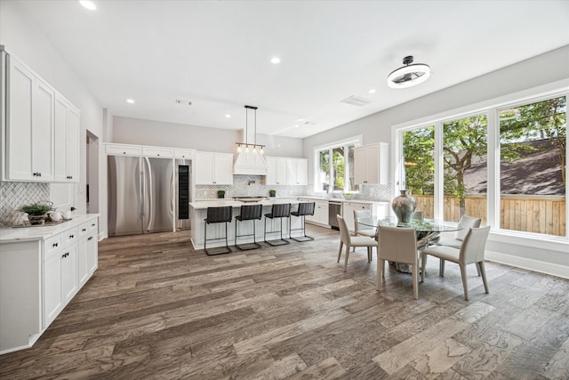 2065 Southgate Blvd, Houston, TX 77030 - dining area featuring dark wood-type flooring and recessed lighting