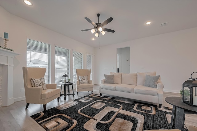 2854 Acacia Grove Dr, Katy, TX 77494 - living area featuring a ceiling fan, light wood finished floors, and recessed lighting