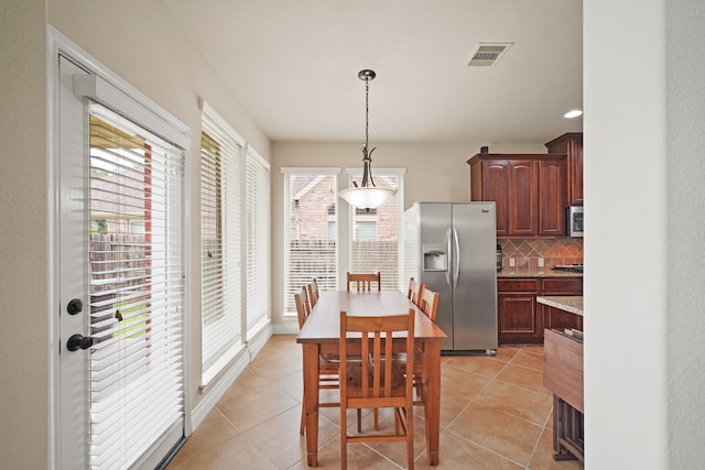 19831 Indigo Key Ct, Cypress, TX 77433 - dining area with light tile patterned flooring and recessed lighting