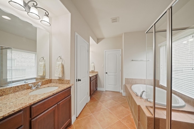 19831 Indigo Key Ct, Cypress, TX 77433 - full bathroom with vanity, a garden tub, tile patterned flooring, and a shower with door