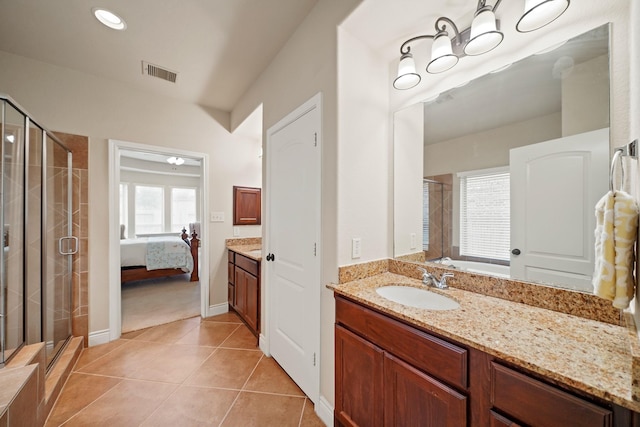 19831 Indigo Key Ct, Cypress, TX 77433 - full bath featuring vanity, a shower stall, tile patterned floors, and ensuite bathroom