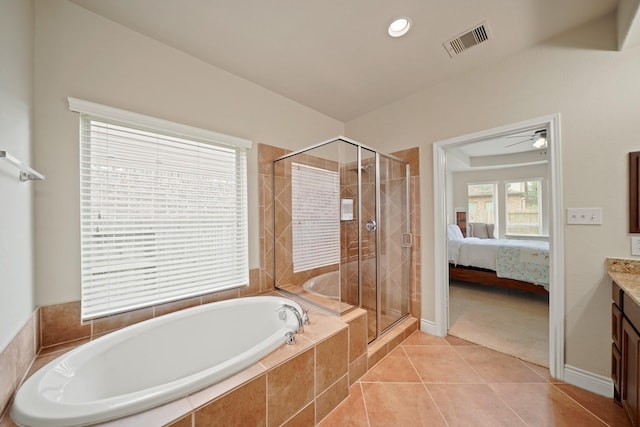 19831 Indigo Key Ct, Cypress, TX 77433 - ensuite bathroom with a bath, vanity, a shower stall, tile patterned floors, and recessed lighting