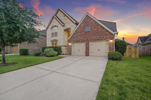19831 Indigo Key Ct, Cypress, TX 77433 - french provincial home featuring driveway, brick siding, stone siding, and a shingled roof