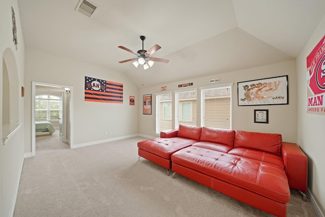 19831 Indigo Key Ct, Cypress, TX 77433 - carpeted living room featuring lofted ceiling, ceiling fan, and arched walkways