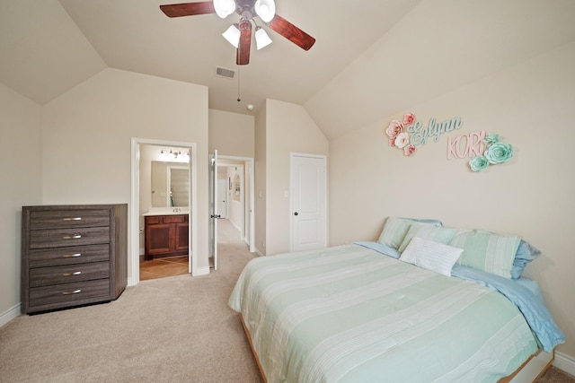 19831 Indigo Key Ct, Cypress, TX 77433 - bedroom with lofted ceiling, light carpet, ceiling fan, and ensuite bathroom