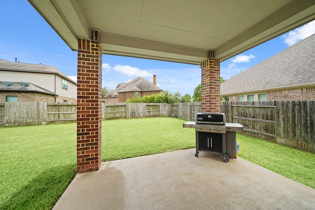 19831 Indigo Key Ct, Cypress, TX 77433 - fenced backyard with a patio area and area for grilling