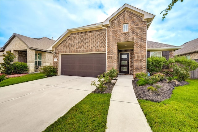 11442 Harmony Summit Trce, Richmond, TX 77406 - view of front of house with brick siding, concrete driveway, an attached garage, a front yard, and a shingled roof