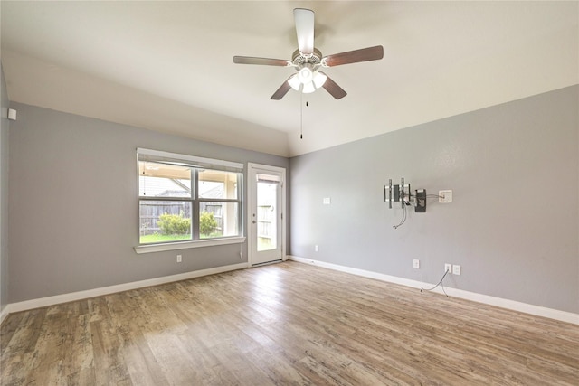 11442 Harmony Summit Trce, Richmond, TX 77406 - empty room with wood finished floors, ceiling fan, and lofted ceiling