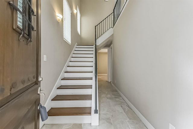 6107 Stillman St, Houston, TX 77007 - stairs with baseboards and a high ceiling