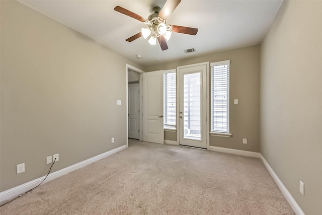6107 Stillman St, Houston, TX 77007 - unfurnished room featuring ceiling fan and light carpet