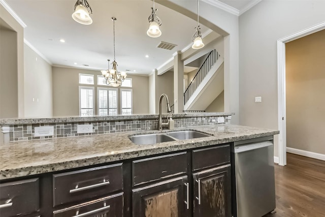 6107 Stillman St, Houston, TX 77007 - kitchen with dishwasher, crown molding, a chandelier, dark wood-style floors, and light stone countertops
