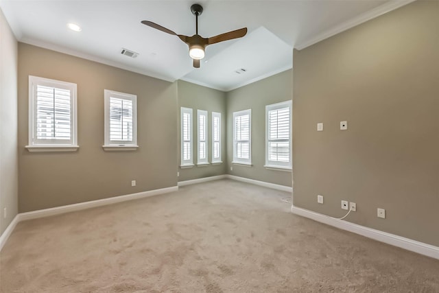 6107 Stillman St, Houston, TX 77007 - unfurnished room featuring healthy amount of natural light, a ceiling fan, ornamental molding, light colored carpet, and recessed lighting