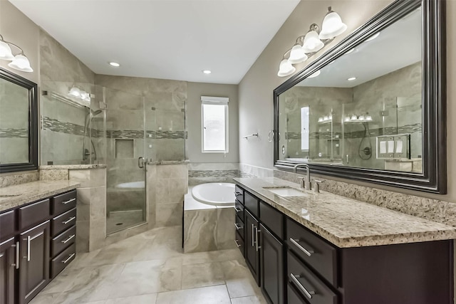 6107 Stillman St, Houston, TX 77007 - bathroom with a shower stall, vanity, a bath, and tile patterned floors