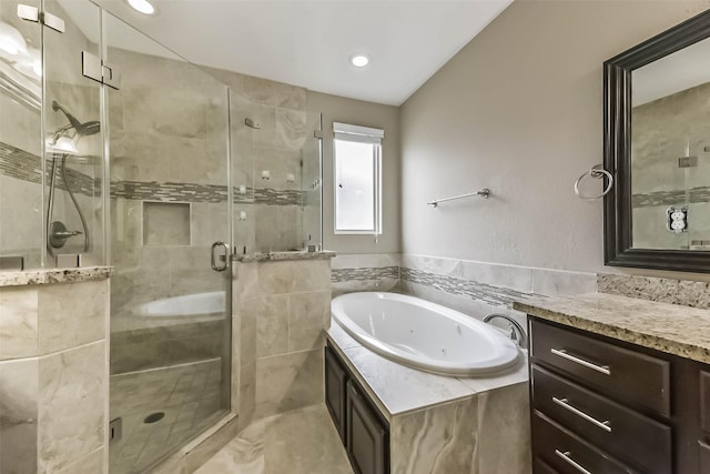 6107 Stillman St, Houston, TX 77007 - bathroom featuring a whirlpool tub, vanity, a stall shower, and recessed lighting