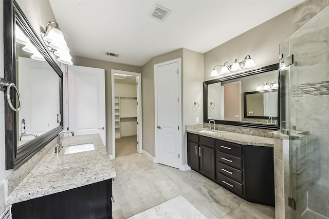 6107 Stillman St, Houston, TX 77007 - full bathroom featuring vanity, a stall shower, and a spacious closet