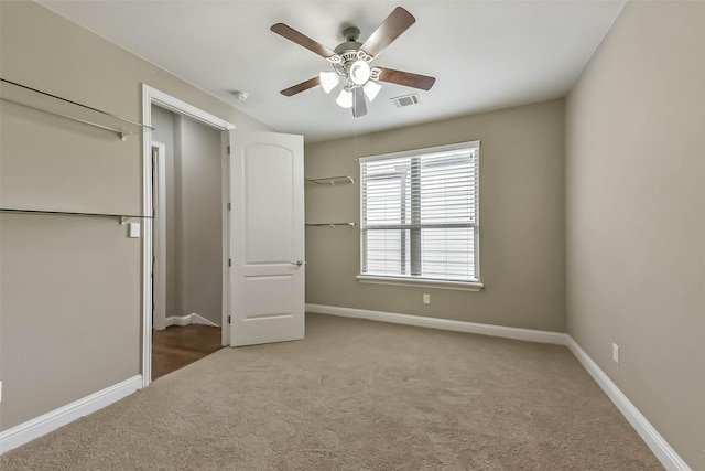 6107 Stillman St, Houston, TX 77007 - unfurnished bedroom with carpet floors and ceiling fan