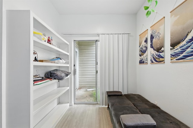 9809 Richmond Ave Unit H10, Houston, TX 77042 - sitting room with wood finished floors