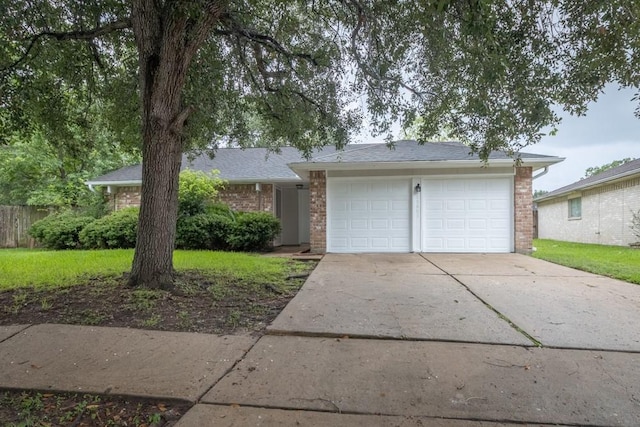 15803 Cerca Blanca Dr, Houston, TX 77083 - ranch-style home featuring an attached garage, concrete driveway, brick siding, and a shingled roof