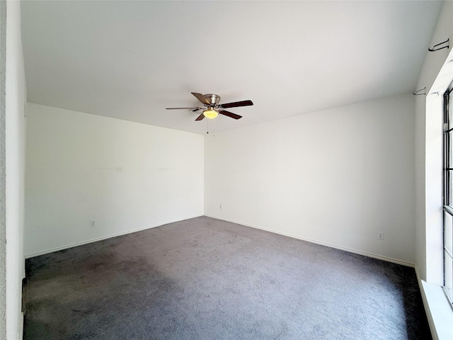 10912 Gulf Fwy Unit 68, Houston, TX 77034 - spare room featuring dark carpet and a ceiling fan