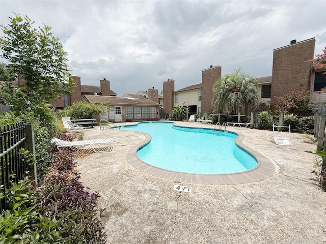 10912 Gulf Fwy Unit 68, Houston, TX 77034 - community pool featuring a patio