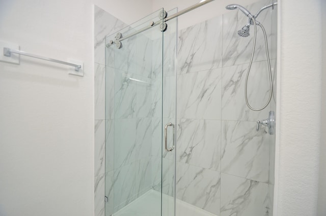 6514 Fraser Point Ct, Spring, TX 77379 - bathroom featuring a marble finish shower