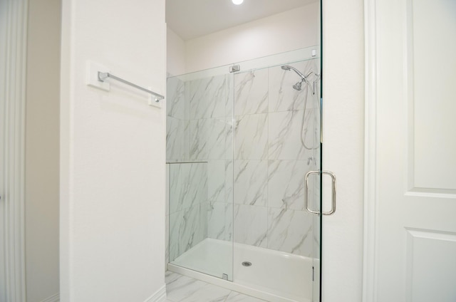 6514 Fraser Point Ct, Spring, TX 77379 - bathroom featuring a marble finish shower and marble finish flooring