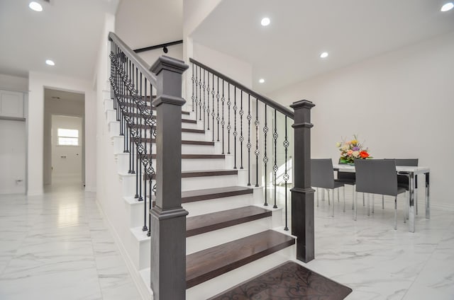 6514 Fraser Point Ct, Spring, TX 77379 - staircase featuring marble finish floors and recessed lighting