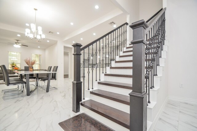 6514 Fraser Point Ct, Spring, TX 77379 - staircase featuring marble finish floors, recessed lighting, ceiling fan, and a chandelier