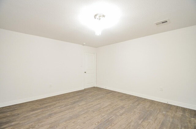 6514 Fraser Point Ct, Spring, TX 77379 - empty room with wood finished floors
