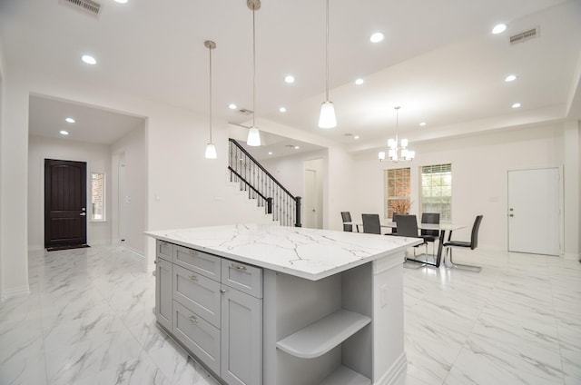 6514 Fraser Point Ct, Spring, TX 77379 - kitchen featuring gray cabinetry, open shelves, a kitchen island, recessed lighting, and light marble finish floors