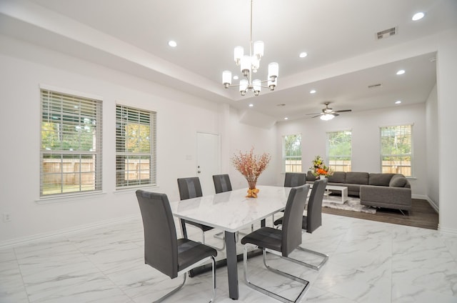6514 Fraser Point Ct, Spring, TX 77379 - dining area featuring light marble finish floors, recessed lighting, a chandelier, and ceiling fan