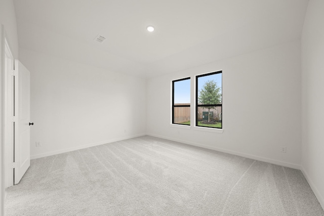 11435 Desert Orangetip Way, Cypress, TX 77433 - empty room with light carpet and recessed lighting