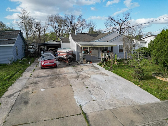 6009 Crane St, Houston, TX 77026 - view of front of property with covered porch and driveway