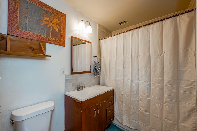 6009 Crane St, Houston, TX 77026 - bathroom with backsplash, vanity, and curtained shower