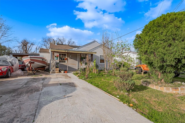 6009 Crane St, Houston, TX 77026 - view of front of house featuring covered porch and concrete driveway